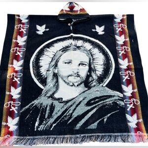 Alpaca handcrafted poncho beautifully designed with the image of Jesus Christ.